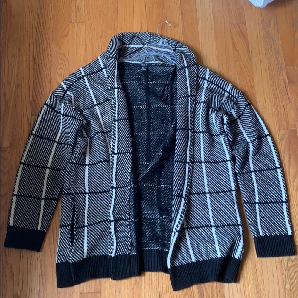 white and black sweater